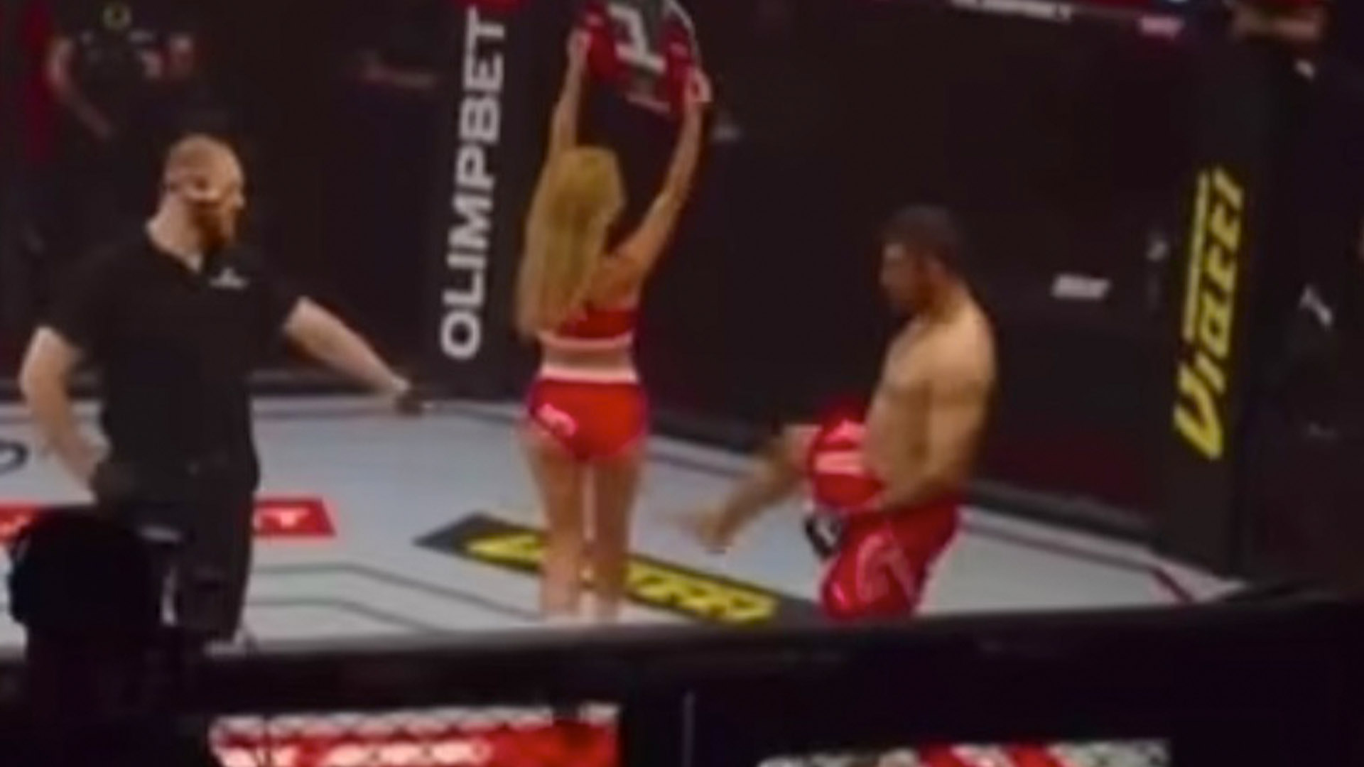 MMA fighter banned for life for kicking RING GIRL – before being attacked by crowd members after knockout loss [Video]