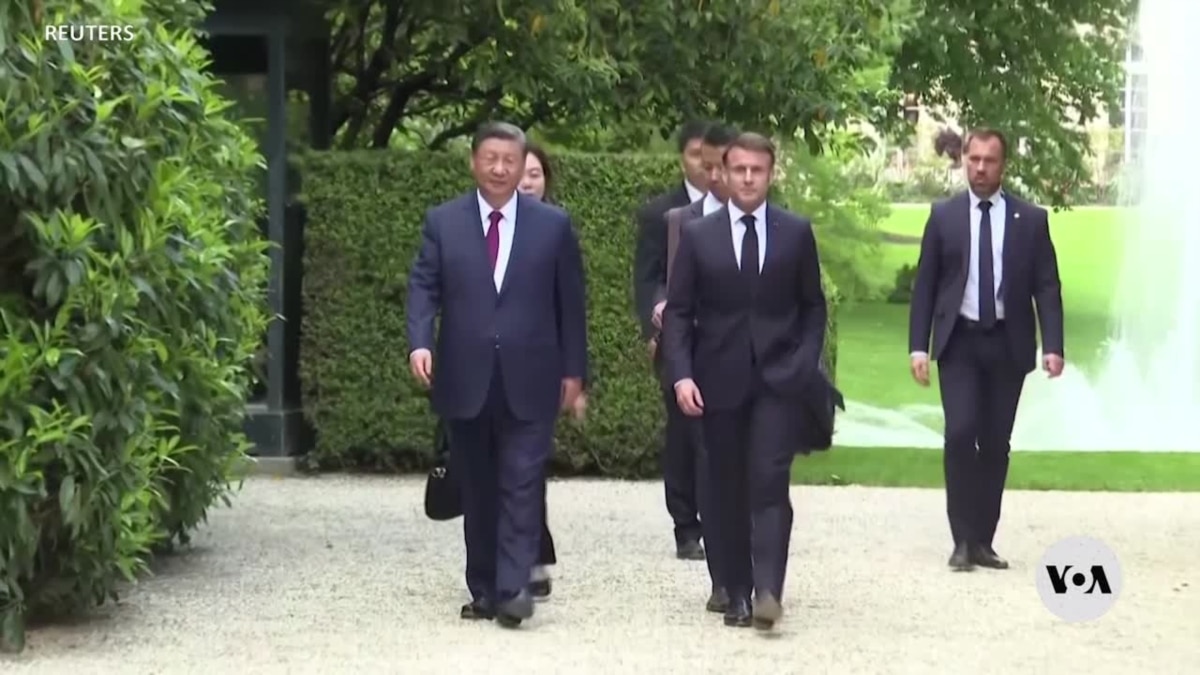 While visiting France, Xi offers few concessions over trade, Russia [Video]
