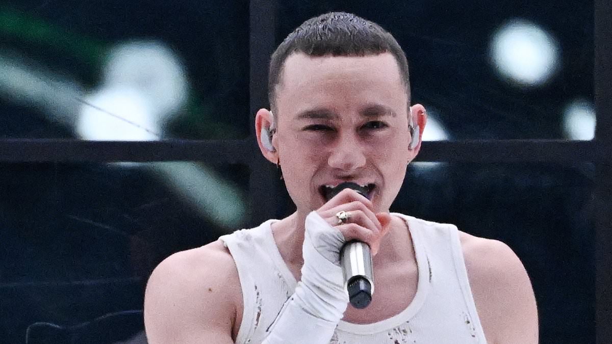 Eurovision fans are left FURIOUS with Olly Alexander’s performance as they call ‘sabotage’ after he suffers sound issues during final [Video]
