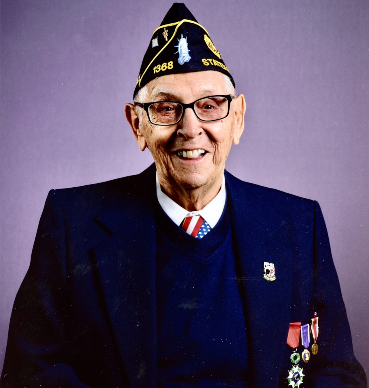 John Tulli, a Purple Heart recipient who saw action in the invasion of Normandy, dies at age 100 [Video]