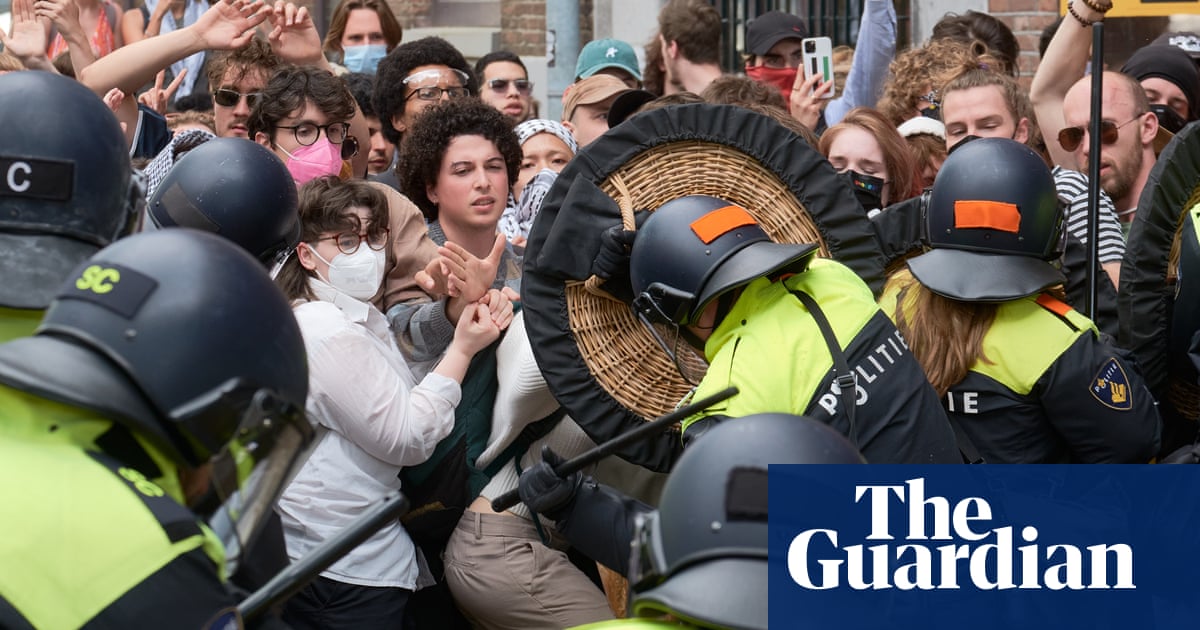 Riot police break up pro-Palestinian protest in Amsterdam  video | World news