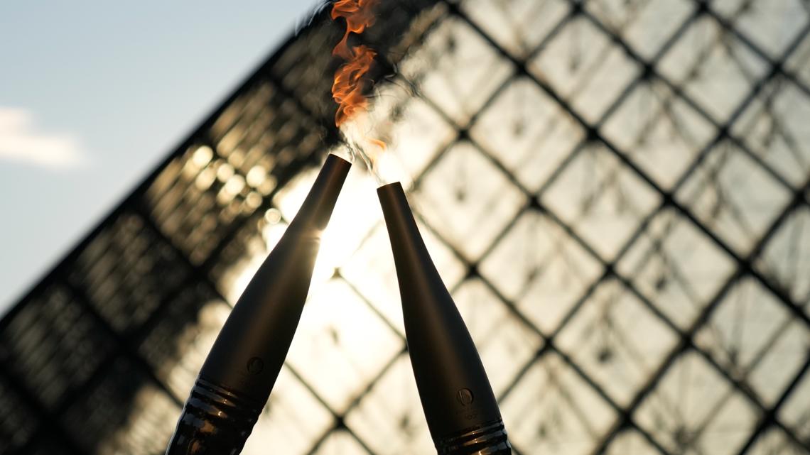 Who is lighting the Olympic cauldron at the Opening Ceremony? [Video]